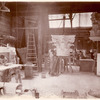 Plaster workshop : men working on models, including a Corinthian capital