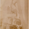 Workers hoisting a block of marble