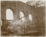 Group of workers standing amid the construction of the Main Reading Room