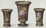 Set of vases. (Painted with exquisite fruit and flower subjects on a gold ground, with jewelled white ornament in relief at rim and base and foot. Height of centre vase 6-1/2 in. Marked "SPODE" 711 in red