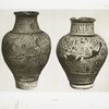 Case B,6. Syrian oliform vase, painted with geese. Height, 13-3/8 in., 13th c. ; Case A,8. Syrian oliform vase, black, splashed with blue. Height, 12-1/4 in.
