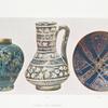 Case A,4. Syrian oliform vase, black and turquoise. Height 5-1/2 in., 13th c.; Case A,2. Syrian jug, ornament in slight relief. H. 7-1/4 in., 13th c. ; Case A,16. Persian bowl, with blue glaze. Diameter, 6-5/8 in., 13th c.
