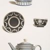Two teapots and a tea cup and saucer. Jasper.