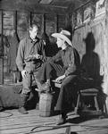 Franchot Tone (Curley McClain) seated & Richard Hale (Jeeter Fry).