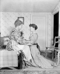 Claire Woodbury (alternating with Helen Westley) in the role of Aunt Eller, with June Walker (kneeling) in Green Grows the Lilacs.