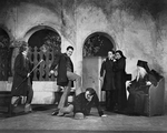 Scene from The Brothers Karamazov (1927). Extreme left Dudley Digges (Feodor Pavlovich), Alfred Lunt (Dmitri) center, Edward S. Robinson (Smerdiakow), on floor. Setting by Simonson.