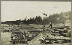 Putting floaters on top of a joint, St. John River, Douglas' Boom.