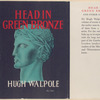 Head in green bronze