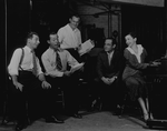 Rehearsal for Fine and Dandy, 1930. L to R: Dave Chasen, Joe Cook, ??, with Paul James (lyricist) and Kay Swift, composer, at piano.