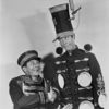 Joe Cook as Joe Squibb and Dave Chasen as Wiffington in Fine and Dandy.