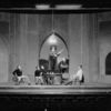 Scene from Theatre Guild's production of "Faust". Dudley Digges as Mephistopheles (standing on table). Set and costumes designed by Lee Simonson. NYC: 1928.