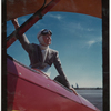 Color photo of Margaret Sullavan on plane for flying lesson