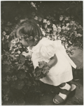 Brooke Hayward picking flowers