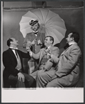 Rex Everhart [center] and unidentified others in the stage production Peer Gynt