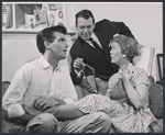 Ron McNeil [left] and unidentified others in the stage production Single Man at a Party