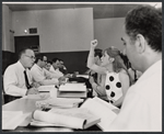 The cast and production team in rehearsal for the stage production Skyscraper