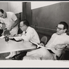 Cy Feuer [center] and unidentified others in rehearsal for the stage production Skyscraper