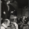 Howland Chamberlain [lower left], George C. Scott [standing left], Gretchen Wyler [seated at right in striped dress] and unidentified others in the stage production Sly Fox