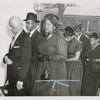 Mrs. Ruby Owens, widow of the Reverend Thomas F. Owens, pastor of the First Baptist Church of Far Rockaway, New York, being escorted to his funeral service, followed by members of her family
