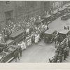 View of pallbearers bringing casket to waiting hearse as funeral mourners and observers look on, outside of Abyssinian Baptist Church, in Harlem, New York