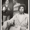 Edward Seamon [standing left], Dennis Tate [seated] and unidentified [standing center] in the stage production Underground
