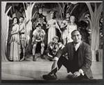 Publicity photo of playwright/director Rick Besoyan (foreground) and clockwise from left: Ruth Buzzi, Danny Carroll, Richard Charles Hoh, Carol Glade, Don Stewart, Joleen Fodor, Elmarie Wendel, and Kenneth McMillan in the stage production Babes in the Wood