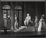 Robert Preston (left), Oliver Clark (on throne), and unidentified cast members in the stage production Ben Franklin in Paris