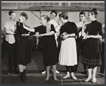 Choreographer Hanya Holm (center holding dancer's arm) and dancers in rehearsal for the stage production Anya