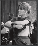 Julie Harris and Gene Saks [background] in the stage production A Shot in the Dark