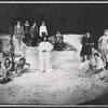Richard Ramos [left foreground], Randy Kim [left foreground], Jaime Sanchez [left foreground], Christopher Allport [standing background], Jeffrey Jones [standing background], Christopher Walken [standing background], Sam Waterston [center], Carol Kane [sitting foreground], Mark Metcalf [sitting foreground], Tom Atkins [standing at far right] and unidentified others in the 1974 Lincoln Center production of The Tempest
