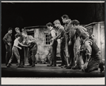 Frank Griso [fighting center left], John Call [fighting center right] and ensemble in the stage production A Time for Singing