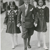 Church is out: Edward Jones (center) escorting Pat Roberts and Edna Dean home from church, Harlem, New York City