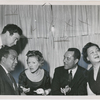 Langston Hughes, seated at left, actress Helen Menken, seated second from left, pianist and composer Margaret Bonds, seated at right, and two unidentified men at an event