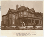 The Cogdell home in Granbury, Texas, with Josephine Cogdell, age five, in yard and her mother and adult sisters gathered on the porch, ca. 1905