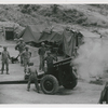 Vietnamese artillerymen fire from a mountain position during field training