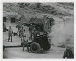 Vietnamese artillerymen fire from a mountain position during field training