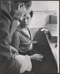 Lena Horne and unidentified in costume fitting for the 1957 stage production Jamaica