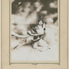 Publicity photograph of Mei Lan Fang (kneeling, palms together)