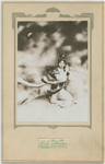Publicity photograph of Mei Lan Fang (kneeling, palms together)