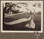 Edith James Long performing a Chinese scarf dance outdoors