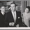 Ray Milland [center] and unidentified others in the stage production Hostile Witness
