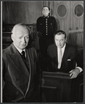 Ray Milland [right] and unidentified others in the stage production Hostile Witness