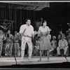Joe Bova, Mary Louise Wilson [clapping in foreground], Howard Freeman [seated at right background], Judy Holliday [standing at right background] and unidentified others in the stage production Hot Spot