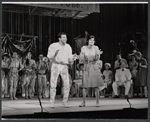 Joe Bova, Mary Louise Wilson [clapping in foreground], Howard Freeman [seated at right background], Judy Holliday [standing at right background] and unidentified others in the stage production Hot Spot