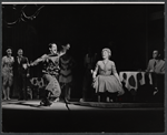 Gerald Teijelo and Judy Holliday and unidentifieds in background in the stage production Hot Spot