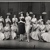 Ensemble in the stage production How to Succeed in Business Without Really Trying