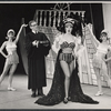 Joy Claussen [center] and ensemble in the stage production How to Succeed in Business Without Really Trying