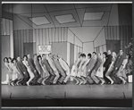 Dancers in the stage production How to Succeed in Business Without Really Trying