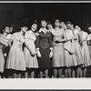 Michele Lee [center] and ensemble in the stage production How to Succeed in Business Without Really Trying