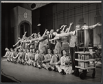 Ralph Purdum [right] and ensemble in the stage production How to Succeed in Business Without Really Trying